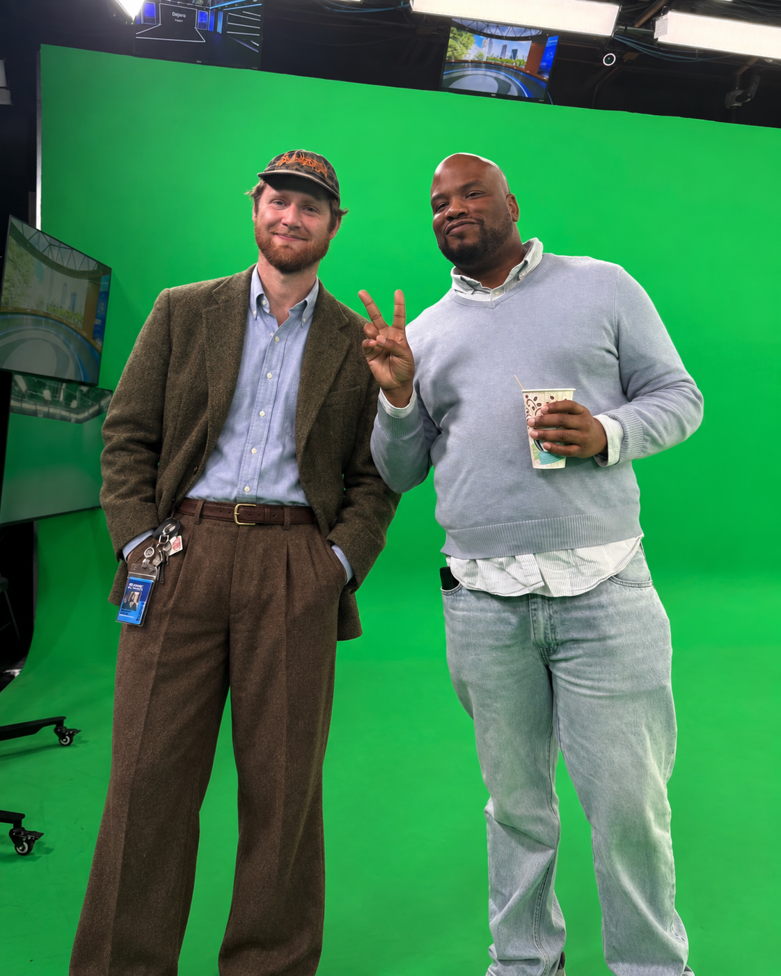 Brandon Knapp with a colleague in a television studio